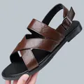 Stylish men's brown leather sandals with cross straps and adjustable buckle strap - 38 / Brown