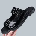 Men's stylish black flat sandals with dual adjustable buckle straps for beach wear - 38 / Black