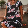 Detail view of casual V-neck short sleeve dress with vibrant pink floral print on black - S / Dresses / Black Base Pink Floral (02)