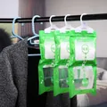 Hanging wardrobe dehumidifier bags with moisture-absorbing white beads - Green Dehumidifier Bag / 50.00g