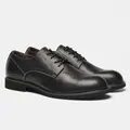 Dettaglio ravvicinato della trama in pelle martellata delle scarpe Derby nere - 39 / Nero Motivo Litchi (KD6671)