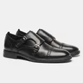 Primo piano laterale di scarpe monk strap in pelle nera con dettagli brogue raffinati - 39 / Stile Monk a Doppia Fibbia Brogue (KD1181)