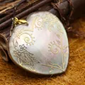Heart-shaped natural shell pendant featuring elegant gold-inlaid floral and vine patterns - Heart Floral Style (Style 2)