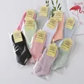 Detailed view of assorted color low-cut socks in individual OPP bags with display tags - One Size / Individually Packaged Option / Mixed Colors