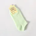 Mint green invisible low-cut boat socks with ribbed texture and retail tag packaging - One Size / Invisible Boat Socks / Fruit Green