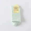 Soft pale mint green low cut invisible cotton blend boat socks with cardboard header packaging - One Size / Green
