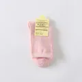 Soft pink low-cut foot cover socks with cardboard packaging tag for women - One Size / Pink