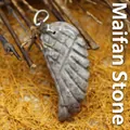 Natural hand-carved wing pendant in Maifan stone with unique gray and brown speckled texture - Maifan Stone
