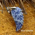 Handcrafted blue spotted natural stone wing shaped carved pendant with silver metal bail - Blue Spot Jasper