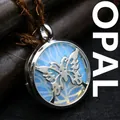 Silver butterfly locket necklace with iridescent opalite stone, pendant jewelry detail - Opal