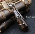 Pendentif griffe de dragon vintage avec une colonne de cristal en œil de tigre naturel - Œil de tigre