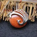 Oversized silver peacock pendant with sparkling round goldstone cabochon for jewelry - Gold Sandstone