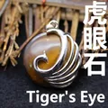 Exquisite peacock pendant necklace crafted with natural polished Tiger's Eye gemstone inlay - Tiger's Eye