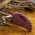 Unique carved reddish-brown iron ore stone wing pendant jewelry with polished silver bail - Yellow Jasper