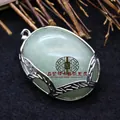 Eleganter ovaler grüner Aventurin-Anhänger mit silbernem durchbrochenem Metallrahmen - Aventurin-Jade