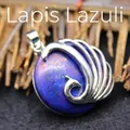 Exquisite artistic peacock pendant featuring a round blue lapis lazuli stone inlay - Lapis Lazuli