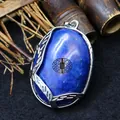 Vintage Lapislazuli-Anhänger in ovaler Form mit filigraner Blätterfassung in Silber-Optik - Lapislazuli