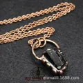 Antique bronze finish necklace featuring a unique raw black stone pendant design - Black Tourmaline with Necklace