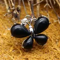 Elegant black onyx butterfly pendant necklace in a polished silver-tone setting - Black Agate