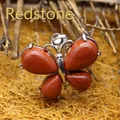 Artisan butterfly pendant featuring natural red jasper stones in a silver setting - Red Jasper