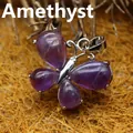 Natural purple amethyst butterfly stone pendant with elegant silver-tone mounting - Amethyst