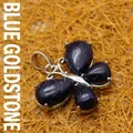 Butterfly necklace pendant featuring deep blue sparkling sandstone stones in silver finish - Blue Sandstone