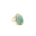 Macro view of green fluorite raw stone ring with intricate gold wire wrap detail - Amazonite