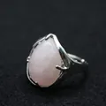 Elegant silver adjustable statement ring featuring a large water-drop shaped rose quartz stone - Rose Quartz