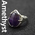 Large teardrop-shaped purple crystal ring featuring an adjustable silver-tone band - Amethyst
