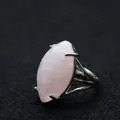 Elegant adjustable silver-tone ring featuring a large marquise-cut pink rose quartz stone - Adjustable Open / Rose Quartz
