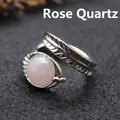 Vintage bohemian style adjustable silver feather open ring featuring a polished pink rose quartz stone - Adjustable Open / Rose Quartz