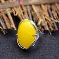 Stunning large oval yellow gemstone ring featuring an adjustable silver-tone band - Adjustable Open / Topaz