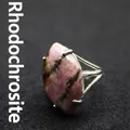 Unique adjustable silver ring featuring a large marquise-cut pink rhodochrosite stone. - Adjustable Open / Rhodonite