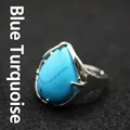 Exaggerated teardrop turquoise statement ring with a polished silver-tone adjustable band - Blue Turquoise