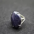 Adjustable silver-tone cocktail ring featuring a large oval sparkling blue goldstone - Adjustable Open / Blue Sandstone
