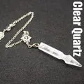 Polished hexagonal white crystal prism pendulum on silver chain with star charm accessory - White Crystal
