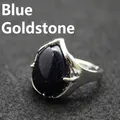 Oversized teardrop blue goldstone statement ring with an adjustable silver-plated band - Blue Sandstone