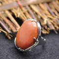 Large adjustable oval goldstone ring with a polished silver-tone metal setting - Adjustable Open / Gold Sandstone