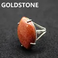 Adjustable silver-tone ring with a large sparkling oval goldstone center - Adjustable Open / Gold Sandstone