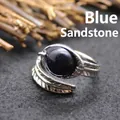 Vintage adjustable feather band ring featuring a round sparkling blue sandstone gemstone - Adjustable Open / Blue Sandstone