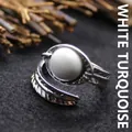 Vintage adjustable silver feather ring featuring a polished white turquoise center stone. - Adjustable Open / Howlite