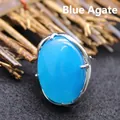 Adjustable silver-tone ring featuring a large oval blue agate stone centerpiece - Adjustable Open / Blue Agate