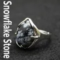 Adjustable silver-tone ring with a large teardrop-shaped natural snowflake obsidian stone - Snowflake Obsidian