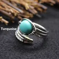 Vintage style silver feather band ring featuring an oval turquoise stone, adjustable open design - Adjustable Open / Turquoise