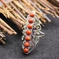 Exaggerated open ring with multiple round red stones in silver filigree frame - Adjustable Open / Red Jasper