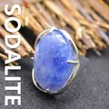 Statement jewelry piece featuring a large oval blue sodalite stone on an adjustable band - Adjustable Open / Blue Sodalite