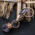 Vintage antique bronze bull head pendant necklace featuring a natural amethyst crystal point - Ox Head Pendant