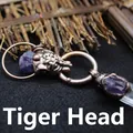 Vintage bronze tiger head pendant necklace featuring raw amethyst and crystal pillar - Tiger Head Pendant