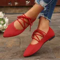 Close-up of red lace-up pointed-toe ballet flats in breathable knit fabric for women - 36 / Red