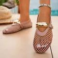 Detailed view of mesh hollow flat sandals featuring a large gold buckle and ankle strap - 35 / Pink
